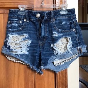 American Eagle jean shorts with lace pockets